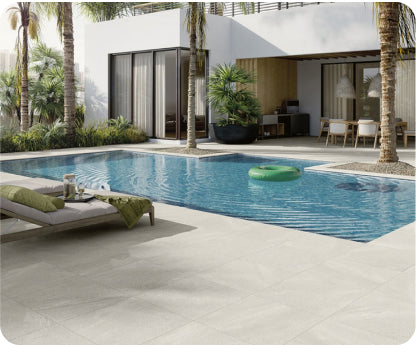 Modern porcelain pavers around a contemporary pool deck